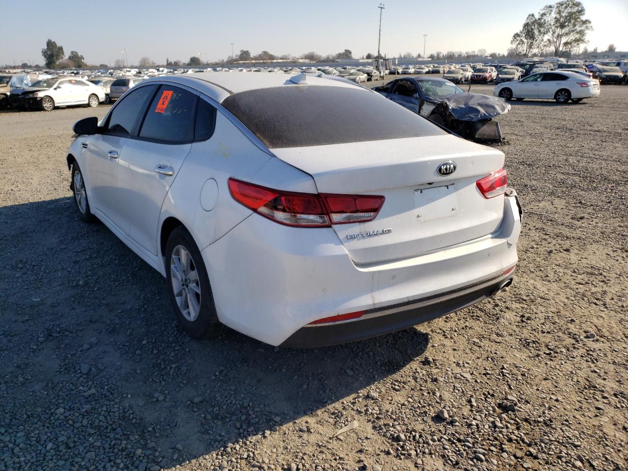 Photo 3 from auction – 2018 KIA OPTIMA LX with VIN 5XXGT4L34JG249940