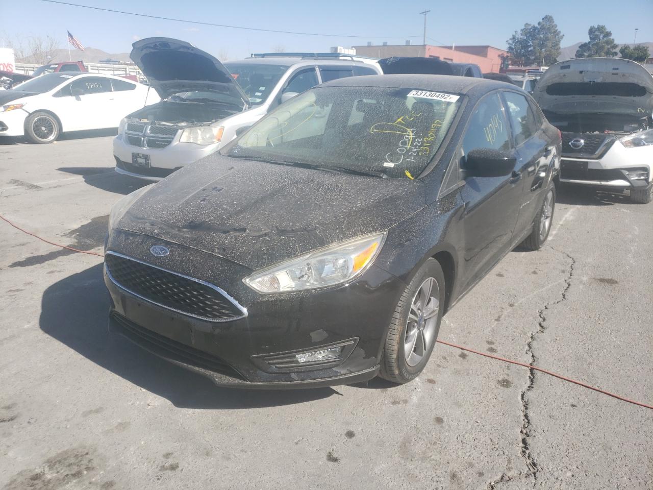 Photo 2 from auction – 2018 FORD FOCUS SE with VIN 1FADP3FE5JL259283
