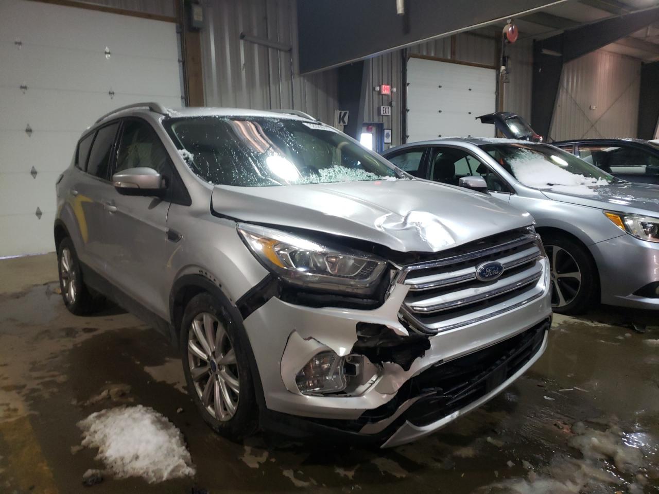 FORD ESCAPE TIT 2017 with VIN 1FMCU9JD4HUB27700 - Photo from auction