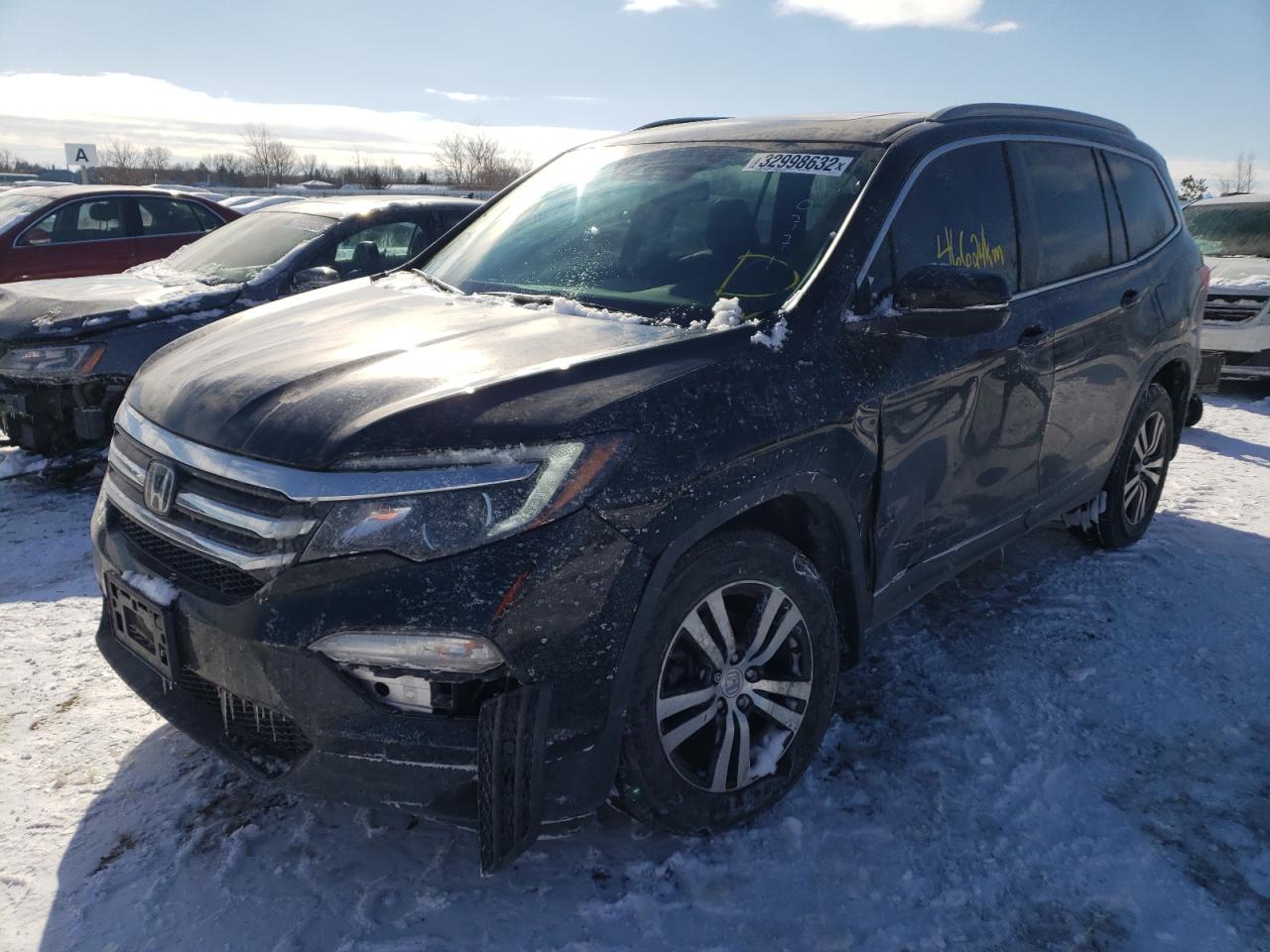 Photo 2 from auction – 2018 HONDA PILOT EXLN with VIN 5FNYF6H76JB500771