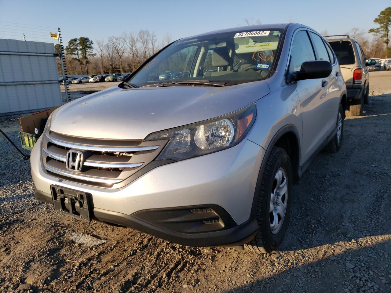 Photo 2 from auction – 2014 HONDA CR-V LX with VIN 3CZRM3H32EG712101