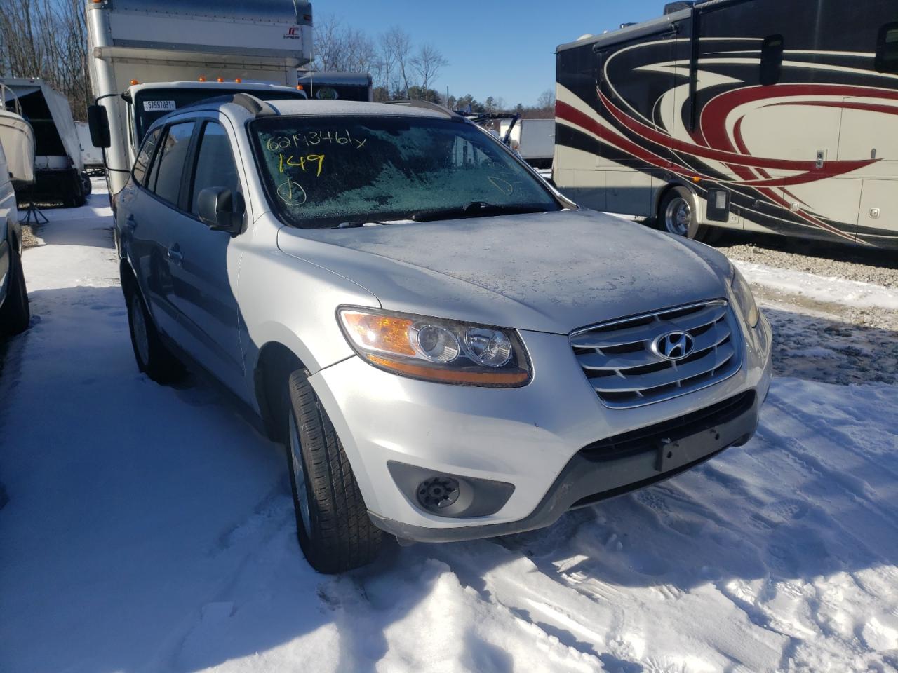 HYUNDAI SANTA FE 2010 with VIN 5NMSGDAB1AH379474 - Photo from auction