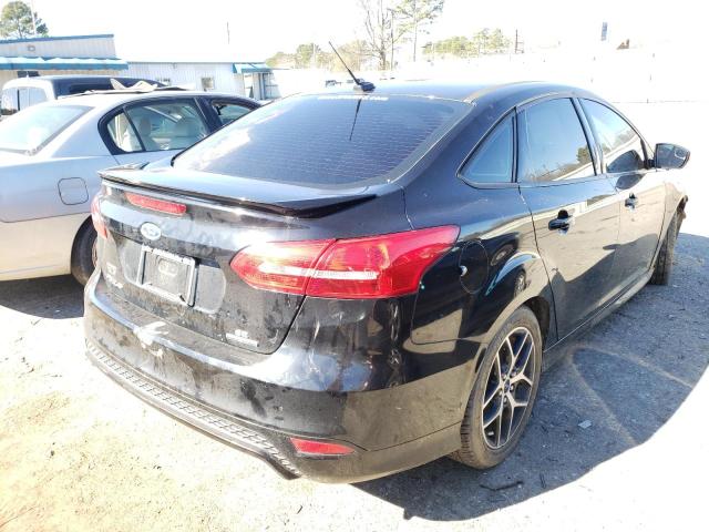 Photo 4 from auction – 2016 FORD FOCUS SE with VIN 1FADP3F22GL394980
