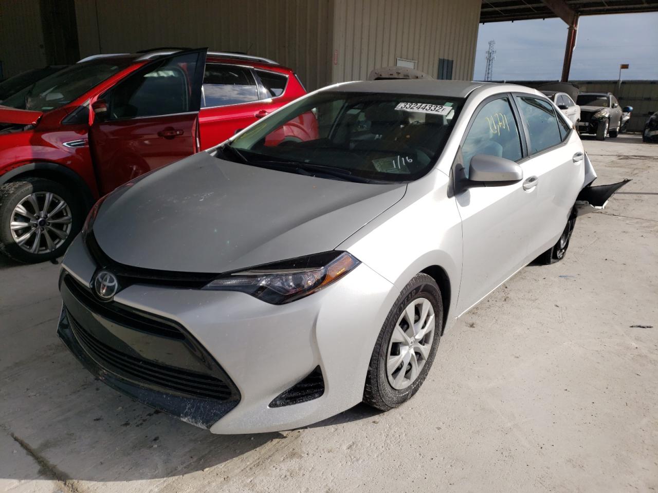 Photo 2 from auction – 2017 TOYOTA COROLLA L with VIN 5YFBURHE1HP612615