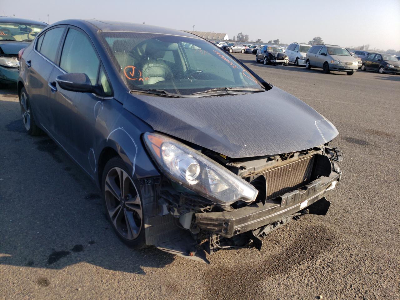 KIA FORTE EX 2014 with VIN KNAFZ4A84E5107331 - Photo from auction
