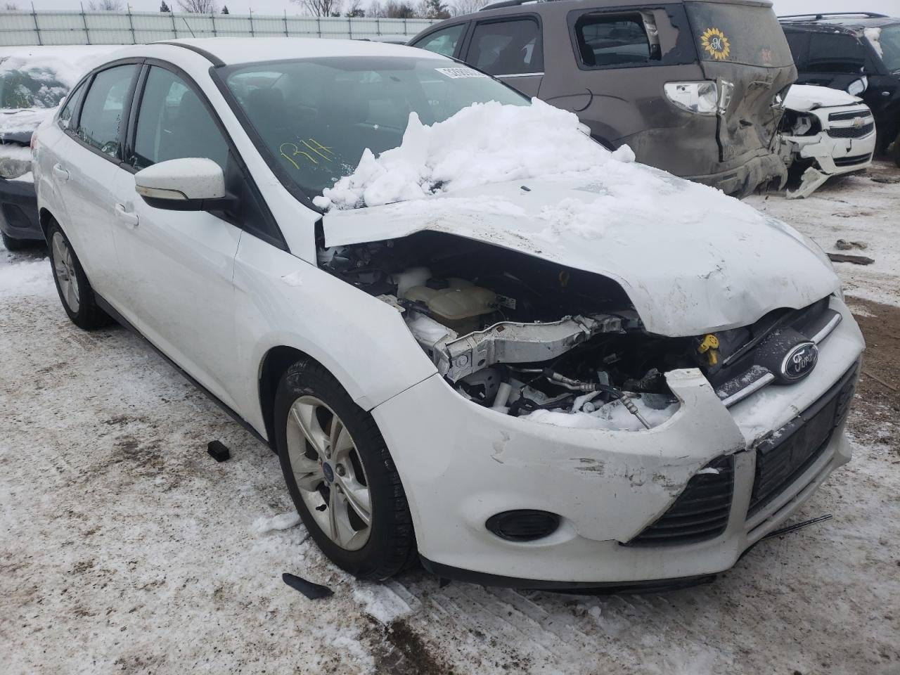 FORD FOCUS SE 2014 with VIN 1FADP3F22EL372099 - Photo from auction