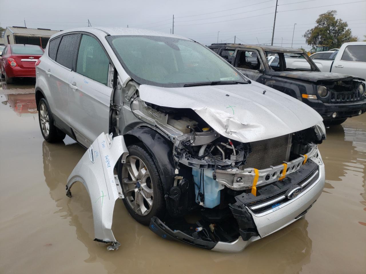 FORD ESCAPE SEL 2013 with VIN 1FMCU0HX8DUB36647 - Photo from auction