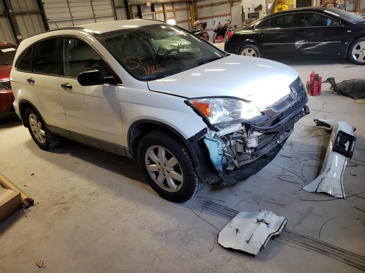 HONDA CR-V SE 2011 with VIN 5J6RE3H46BL057719 - Photo from auction