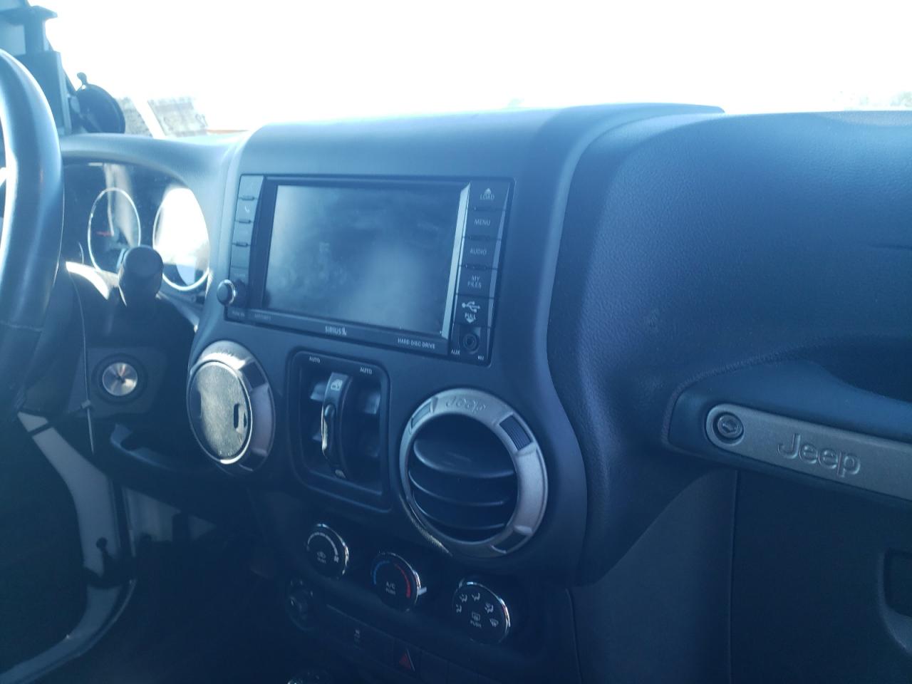 Photo 9 from auction – 2016 JEEP WRANGLER U with VIN 1C4BJWDG3GL130895