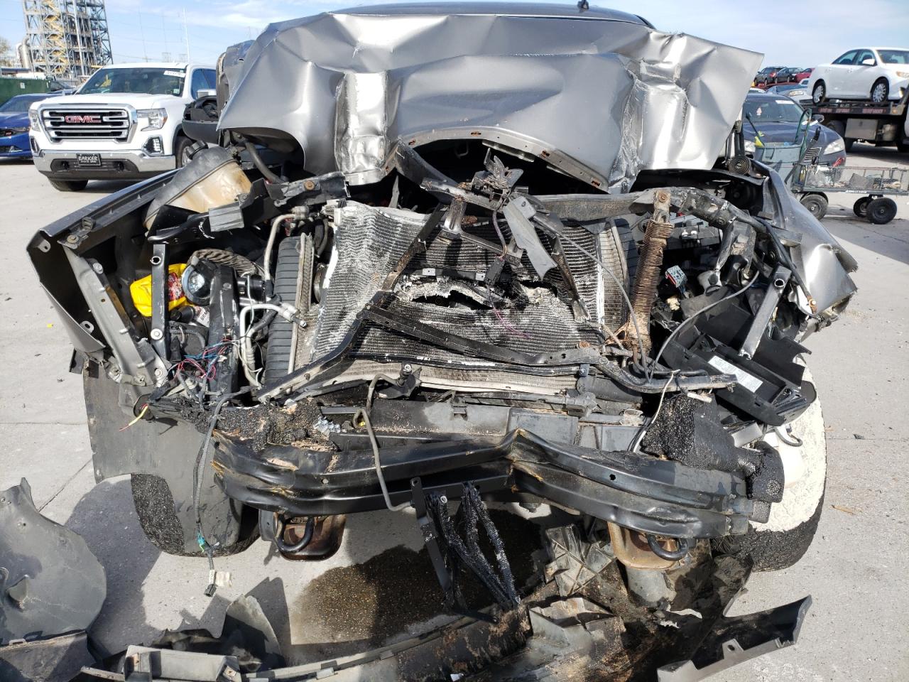 Photo 9 from auction – 2007 GMC YUKON with VIN 1GKFC13077J390512