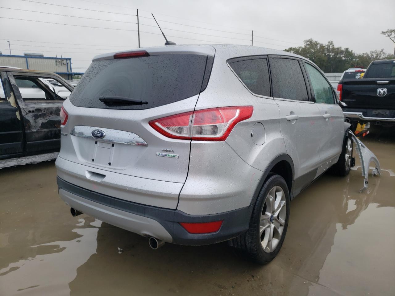 Photo 4 from auction – 2013 FORD ESCAPE SEL with VIN 1FMCU0HX8DUB36647