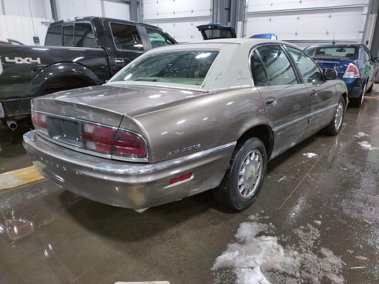 Photo 4 from auction – 1999 BUICK PARK AVE with VIN 1G4CW52K5X4614273