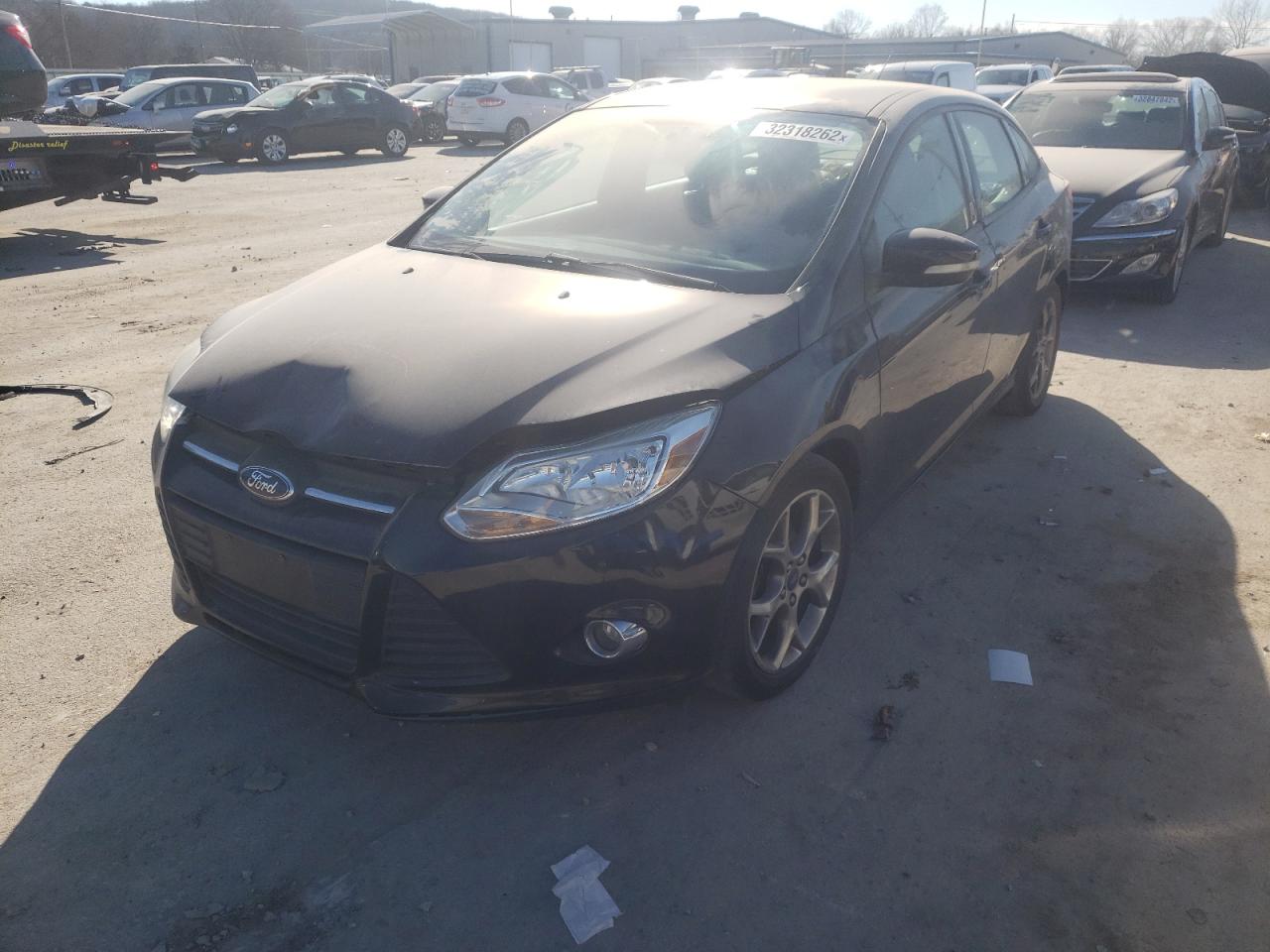 Foto 2 de la subasta – 2014 FORD FOCUS SE con VIN 1FADP3F24EL108902