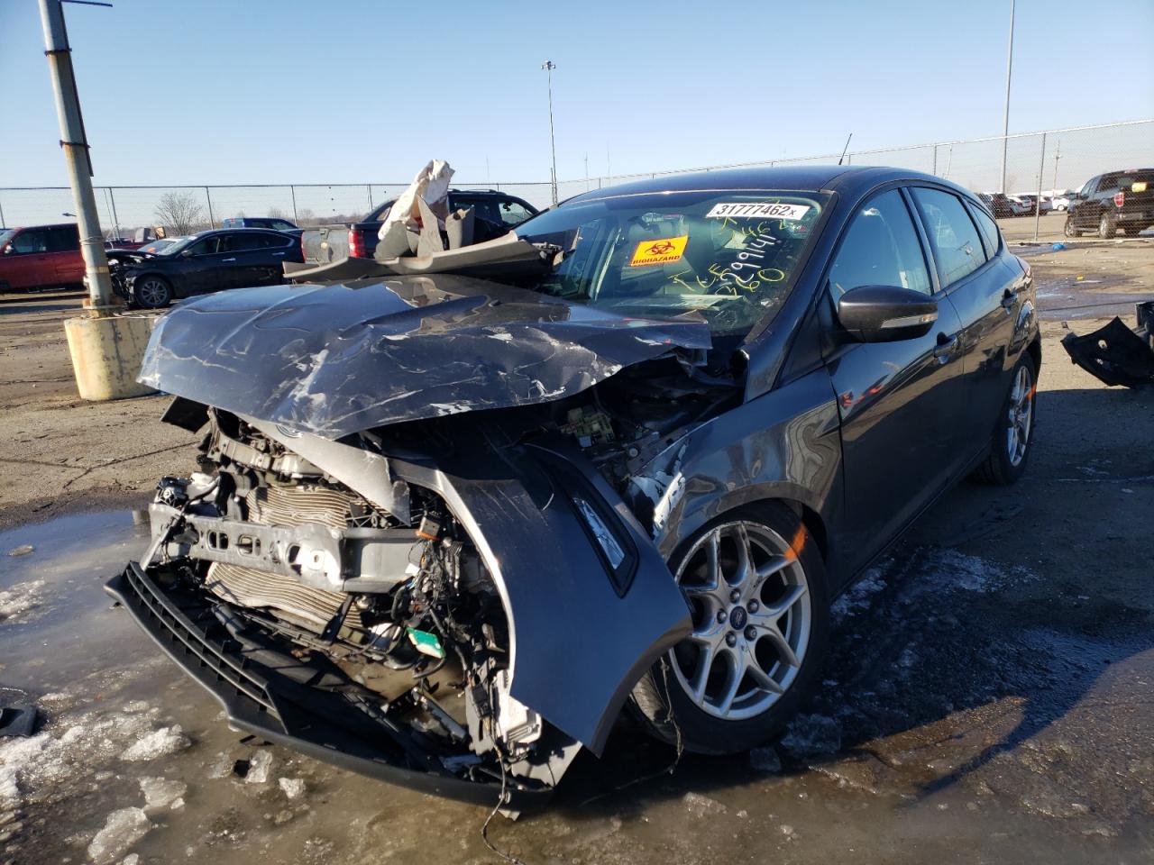 Photo 2 from auction – 2015 FORD FOCUS SE with VIN 1FADP3K25FL299141