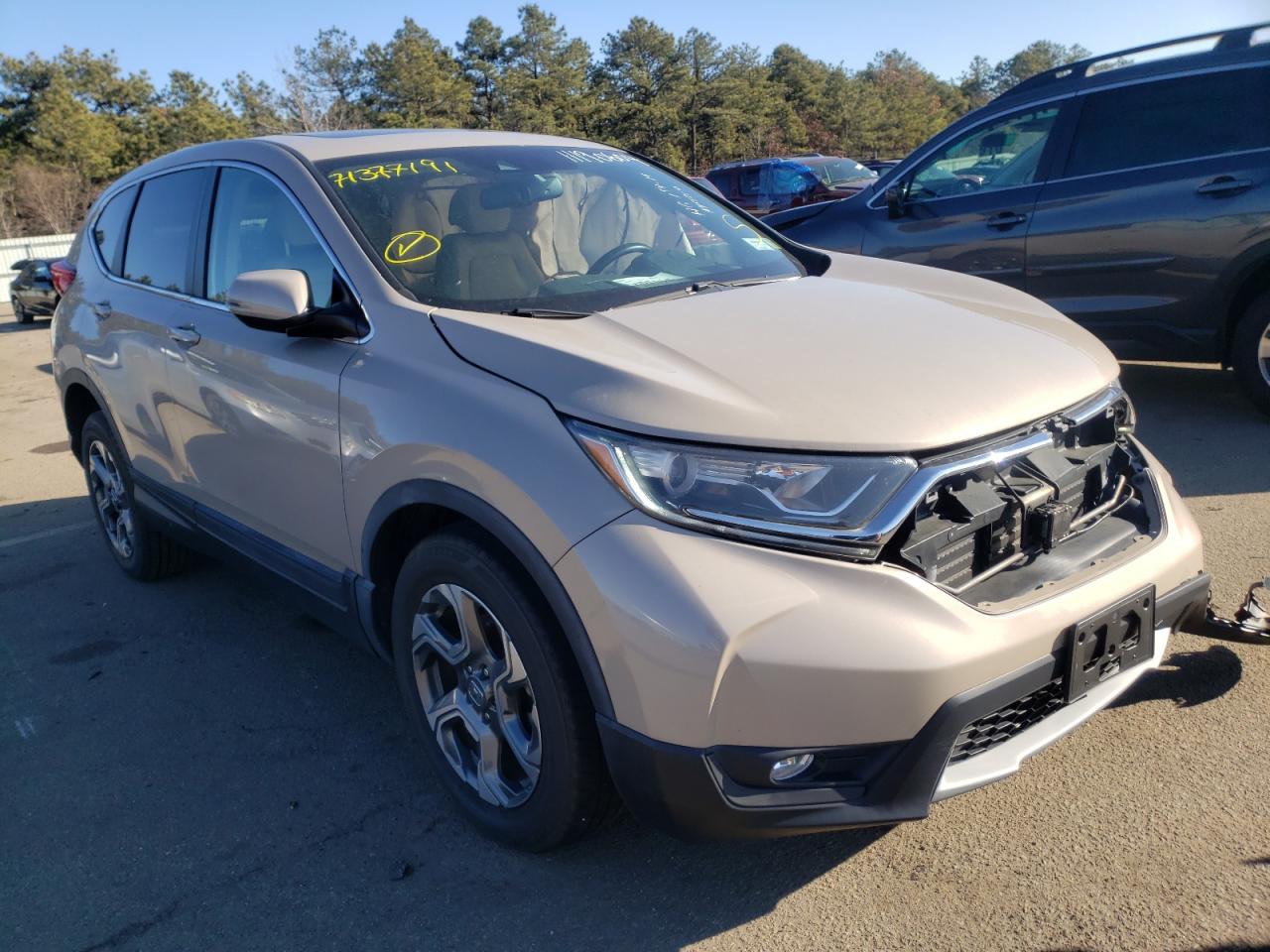 HONDA CR-V EXL 2017 with VIN 5J6RW2H80HL009183 - Photo from auction