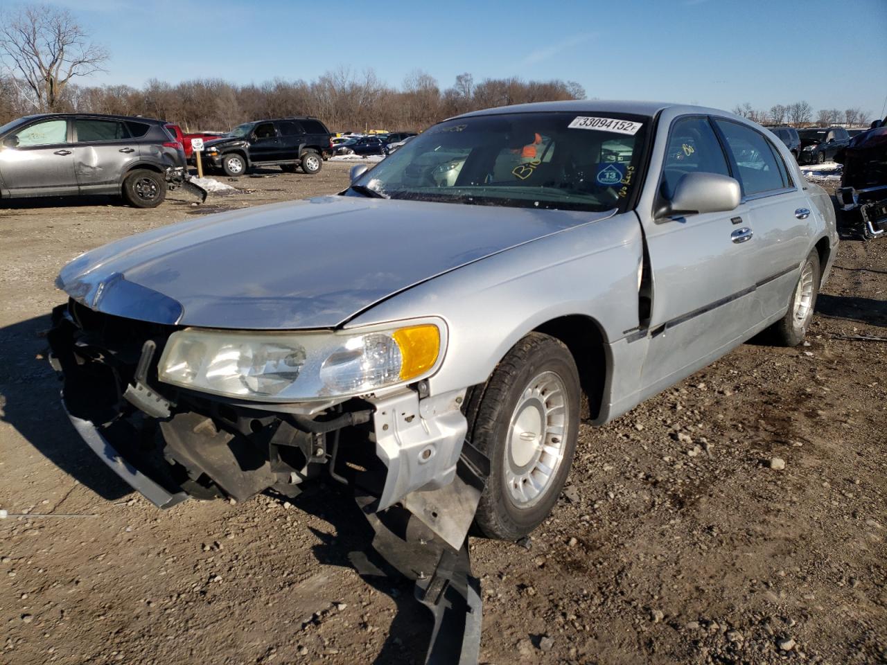 Photo 2 from auction – 2002 LINCOLN TOWN CAR E with VIN 1LNHM81W72Y661372