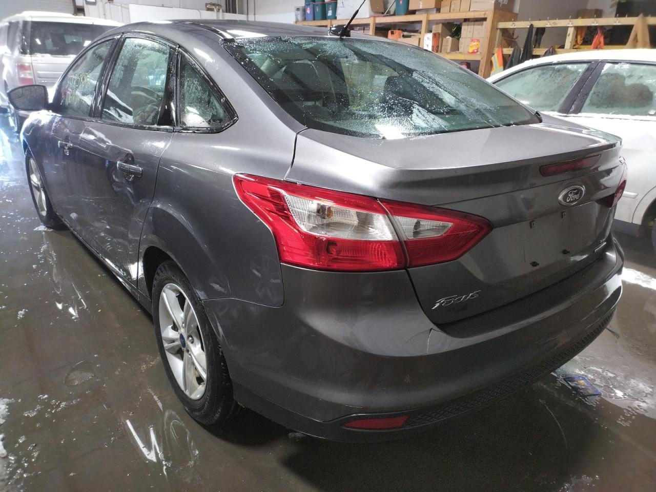 Photo 3 from auction – 2014 FORD FOCUS SE with VIN 1FADP3F24EL428012