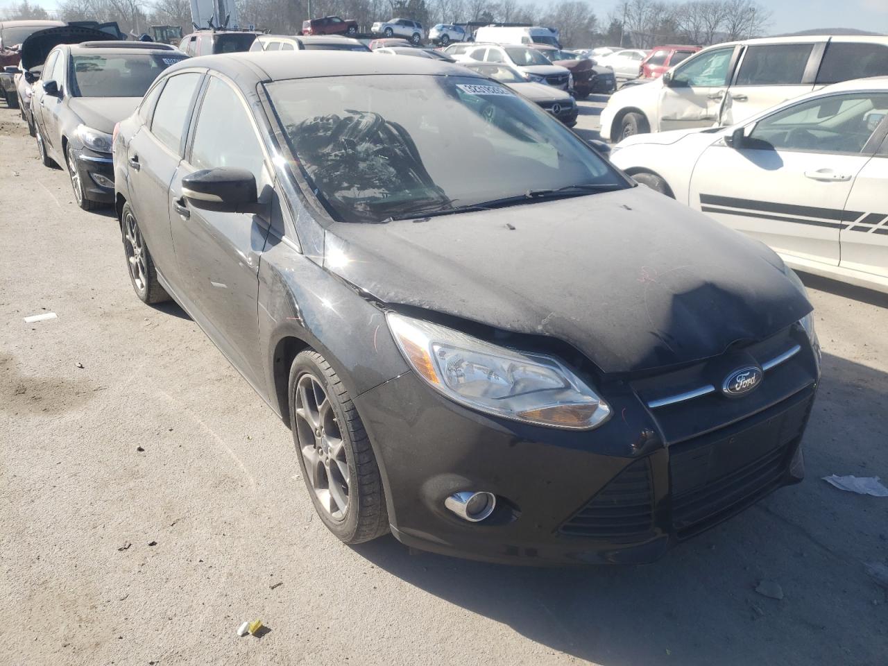 FORD FOCUS SE 2014 con VIN 1FADP3F24EL108902 - Foto de la subasta