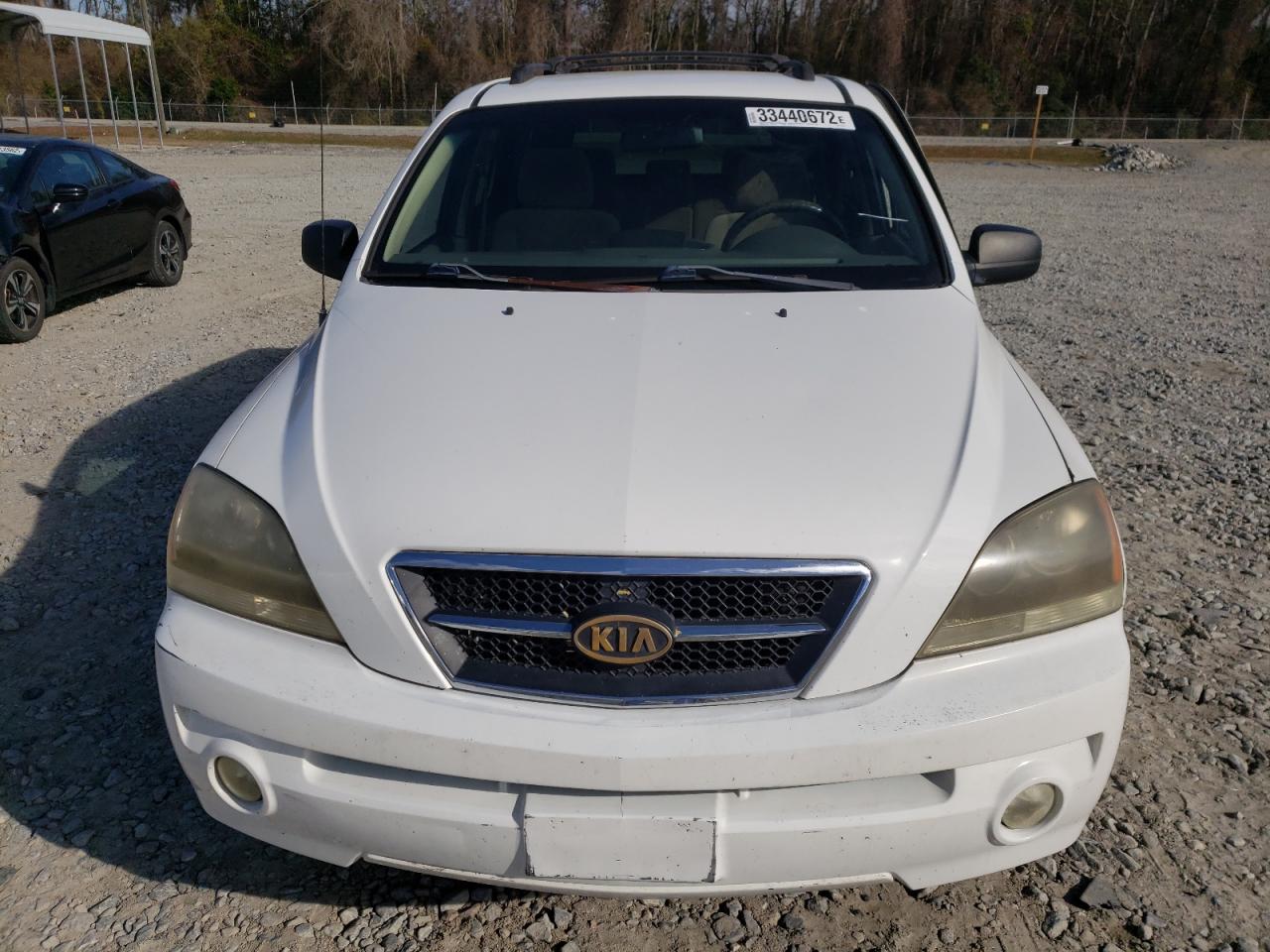 Photo 7 from auction – 2005 KIA SORENTO EX with VIN KNDJD733355368299