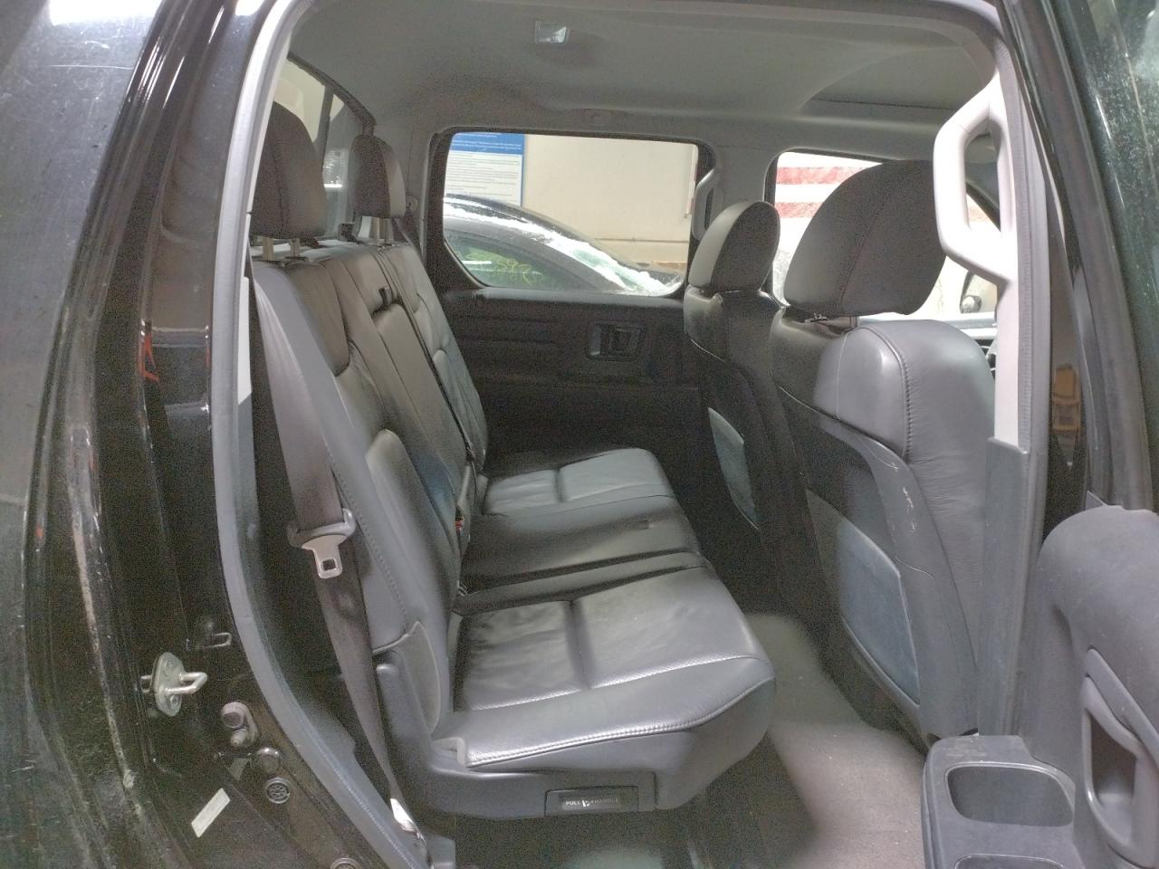 Photo 6 from auction – 2010 HONDA RIDGELINE with VIN 5FPYK1F57AB007785
