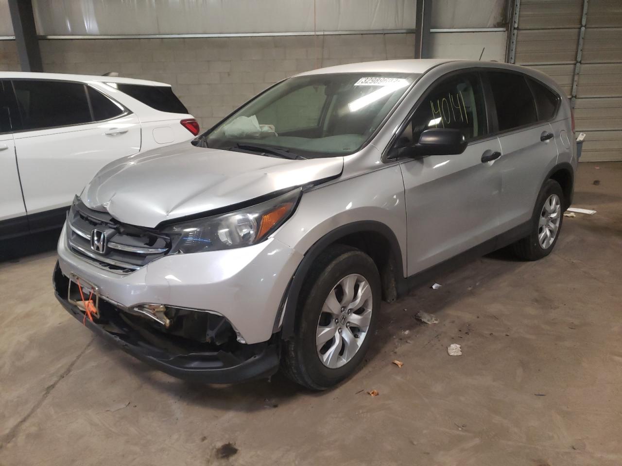 Photo 2 from auction – 2013 HONDA CR-V LX with VIN 2HKRM4H33DH639628