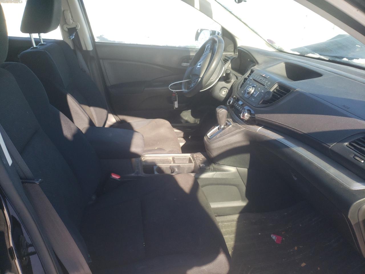 Photo 5 from auction – 2016 HONDA CR-V LX with VIN 5J6RM4H38GL104160