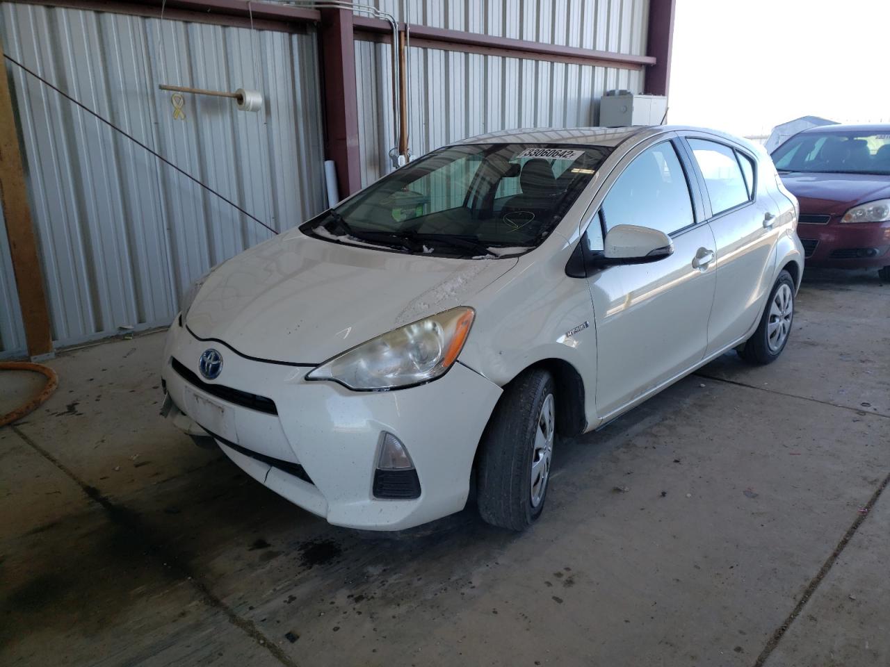 Photo 2 from auction – 2013 TOYOTA PRIUS C with VIN JTDKDTB3XD1541773