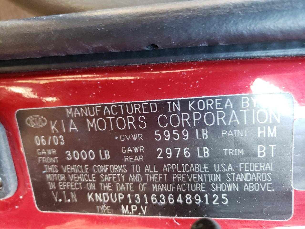 Photo 10 from auction – 2003 KIA SEDONA EX with VIN KNDUP131636489125