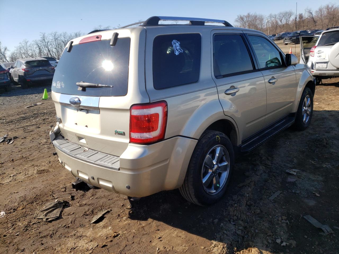 Photo 4 from auction – 2010 FORD ESCAPE LIM with VIN 1FMCU0EG8AKC21774