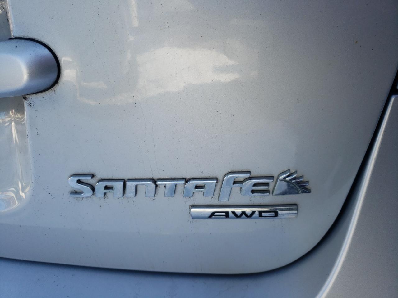 Photo 9 from auction – 2010 HYUNDAI SANTA FE with VIN 5NMSGDAB1AH379474
