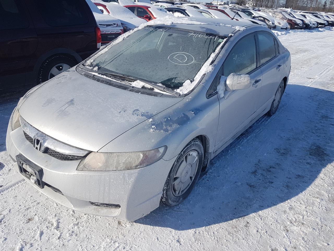 Photo 2 from auction – 2009 HONDA CIVIC HYBR with VIN JHMFA36259S800293