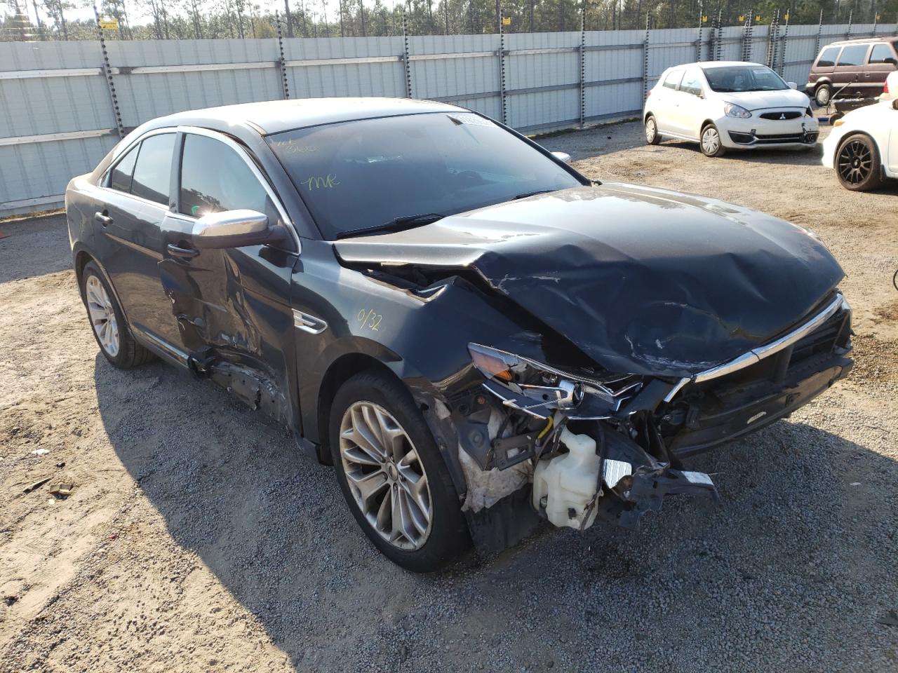 FORD TAURUS LIM 2014 with VIN 1FAHP2F85EG103751 - Photo from auction