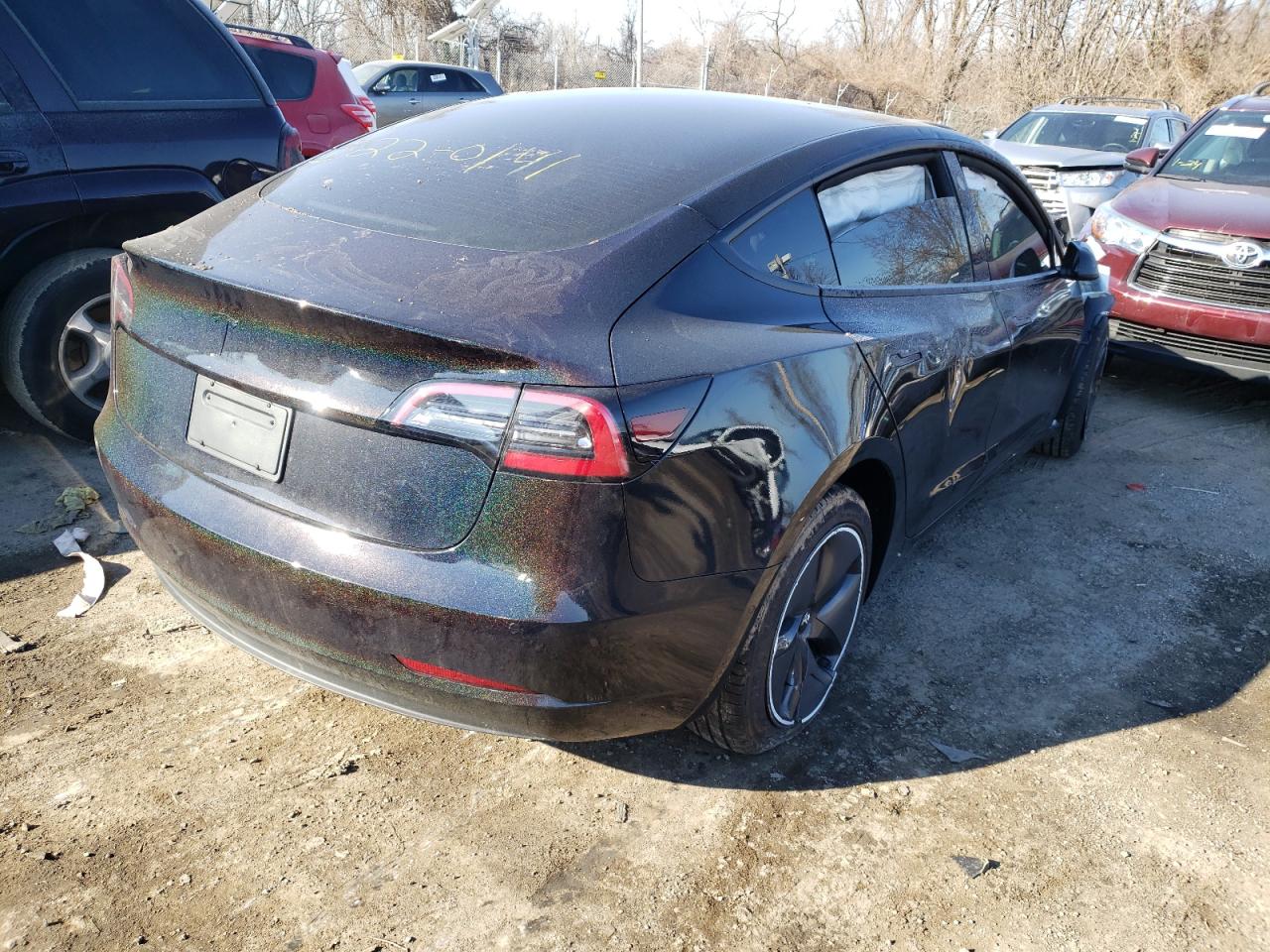 Photo 4 from auction – 2021 TESLA MODEL 3 with VIN 5YJ3E1EA7MF986401