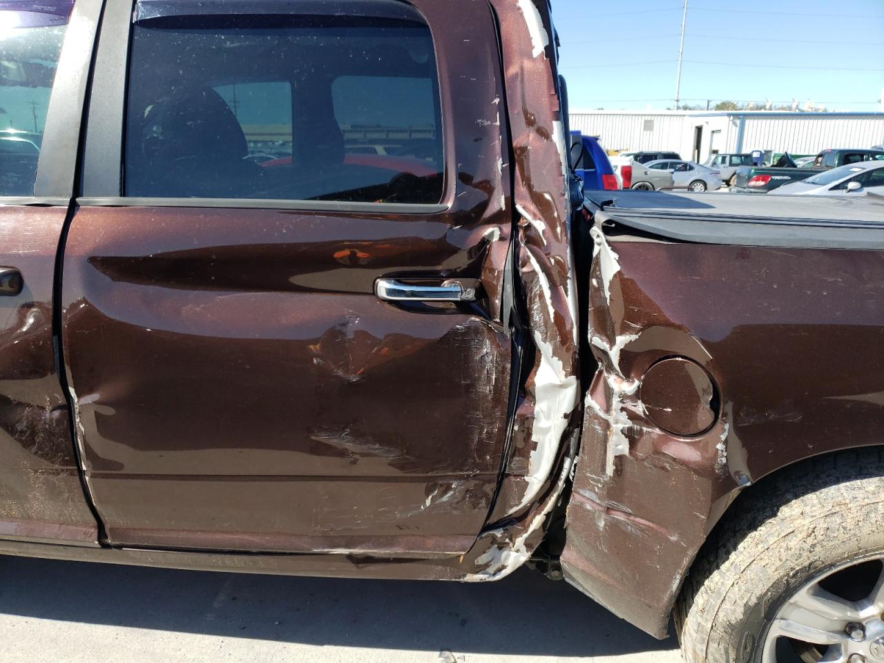 Photo 9 from auction – 2014 RAM 1500 SLT with VIN 1C6RR6LT2ES403437