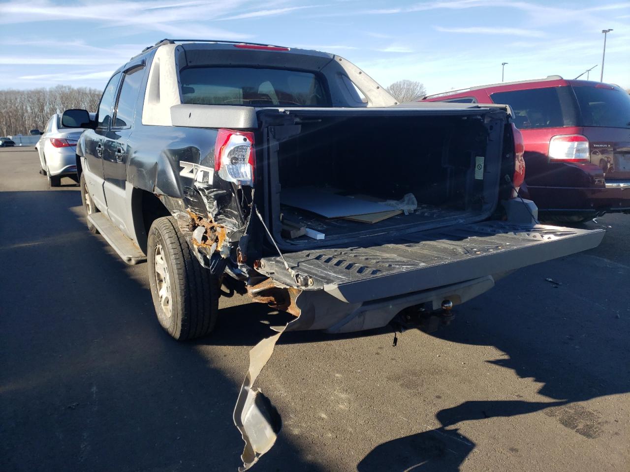 Photo 9 from auction – 2002 CHEVROLET AVALANCHE with VIN 3GNEK13T72G283899