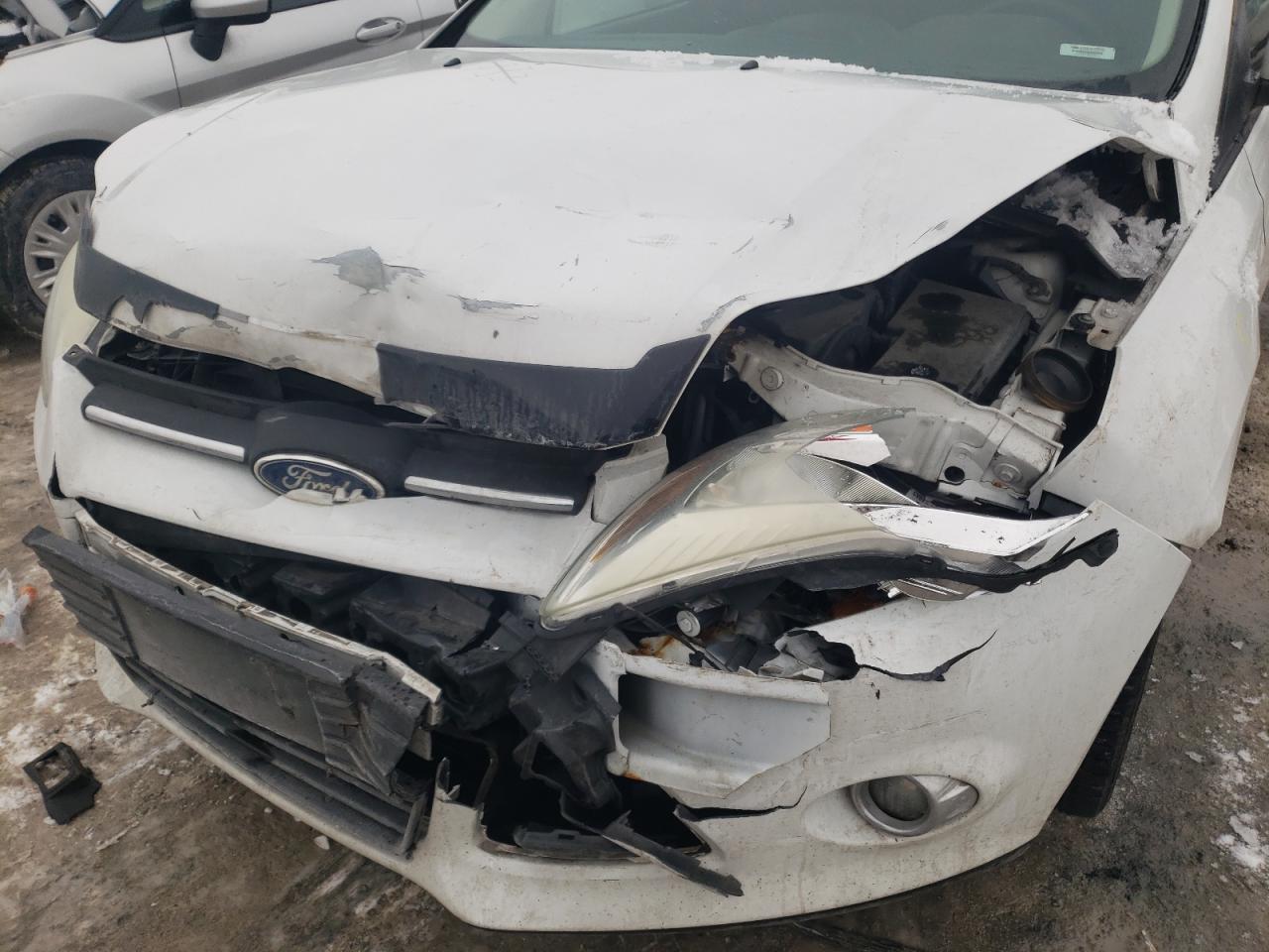 Photo 9 from auction – 2012 FORD FOCUS SE with VIN 1FAHP3F20CL156573