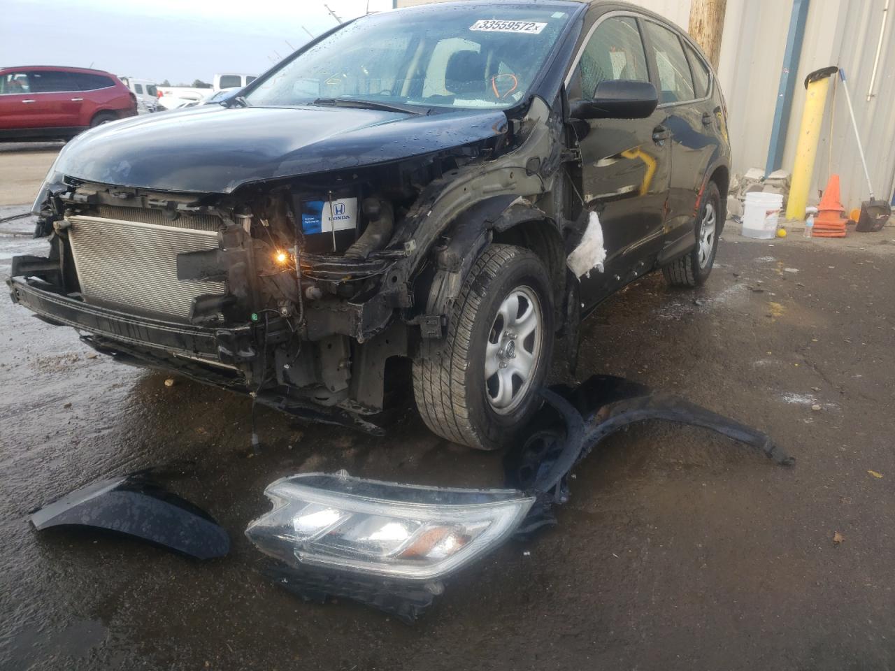Photo 2 from auction – 2016 HONDA CR-V LX with VIN 2HKRM3H35GH502429