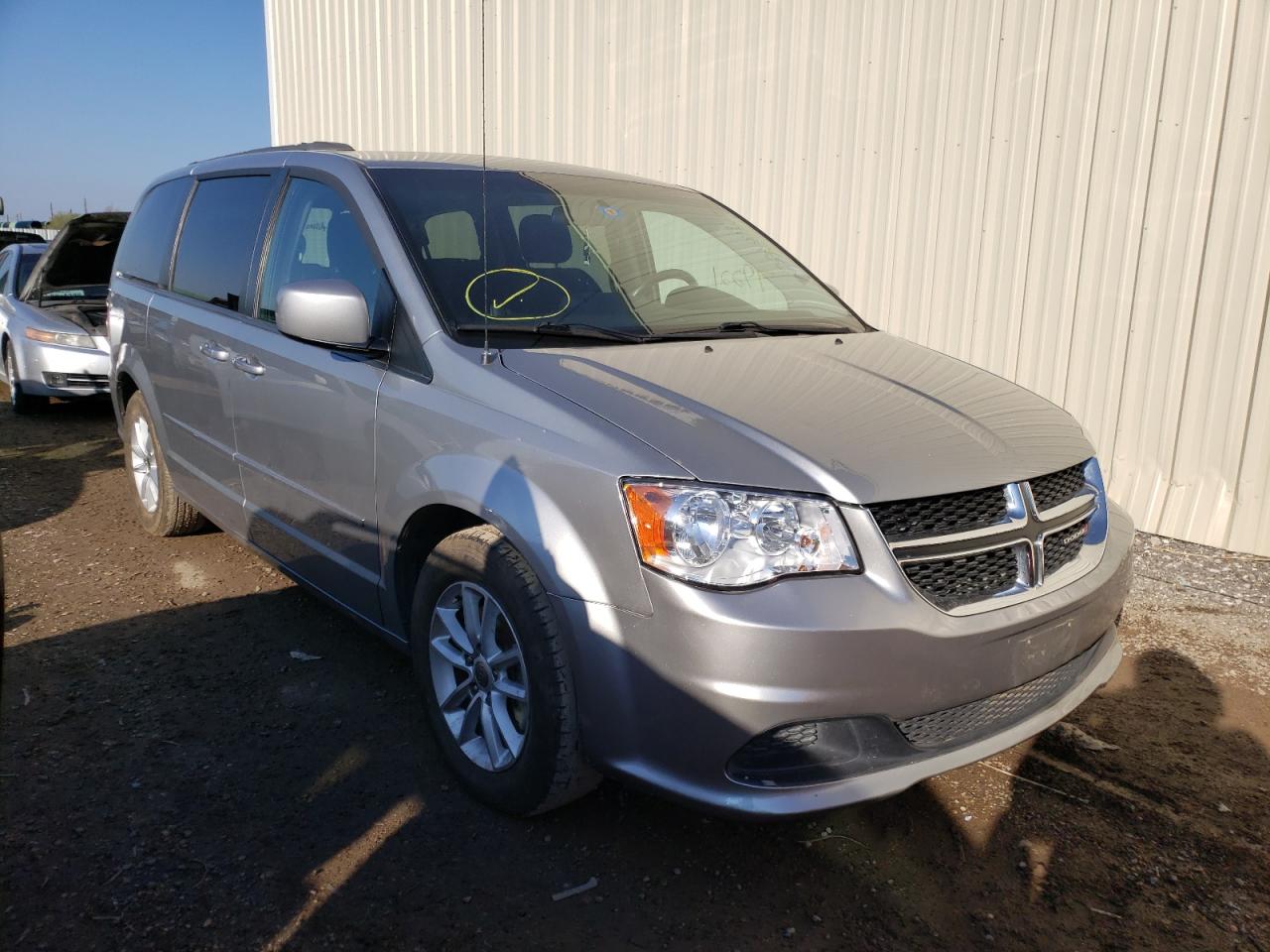 DODGE GRAND CARA 2016 with VIN 2C4RDGCG1GR257231 - Photo from auction