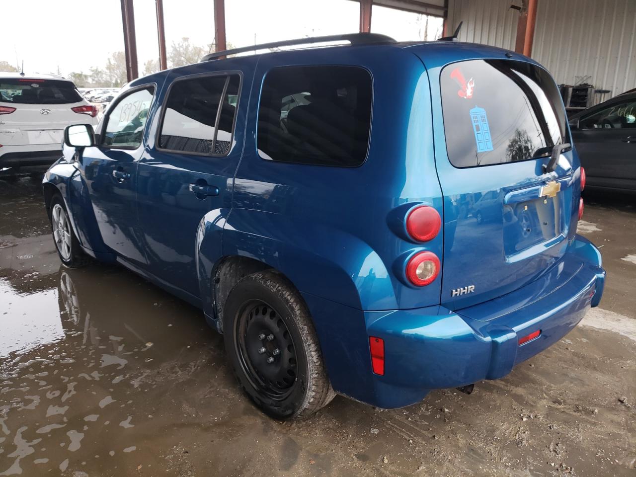 Photo 3 from auction – 2010 CHEVROLET HHR LS with VIN 3GNBAADB5AS529775