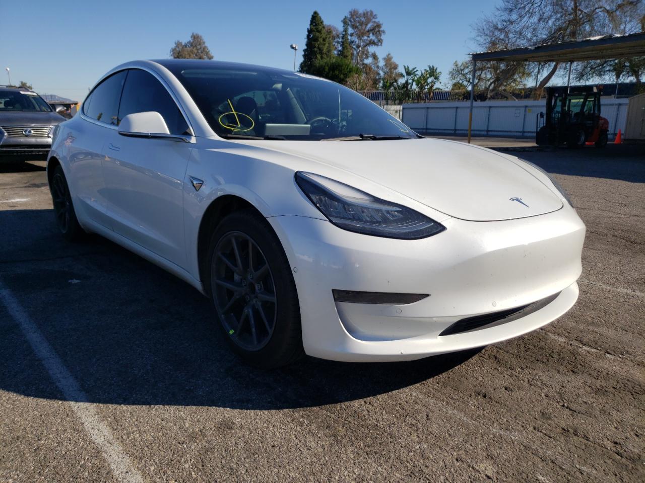 TESLA MODEL 3 2020 with VIN 5YJ3E1EA1LF737221 - Photo from auction