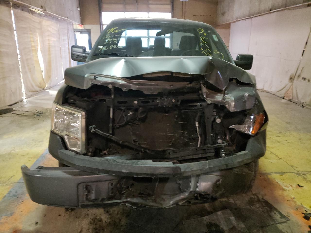 Foto 9 de la subasta – 2014 FORD F150 con VIN 1FTMF1CM7EFA68661