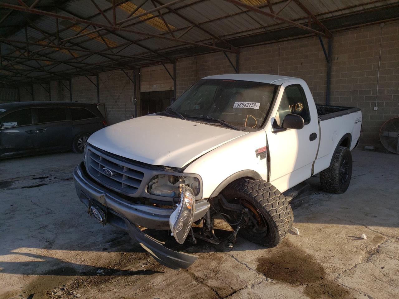 Photo 9 from auction – 2001 FORD F150 with VIN 1FTRF18L01KB05878