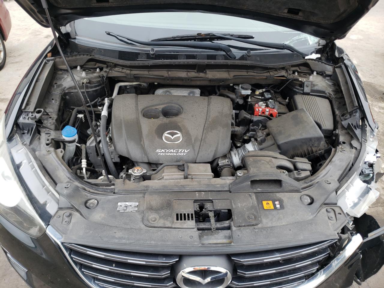 Photo 7 from auction – 2016 MAZDA CX-5 SPORT with VIN JM3KE2BE4G0748072