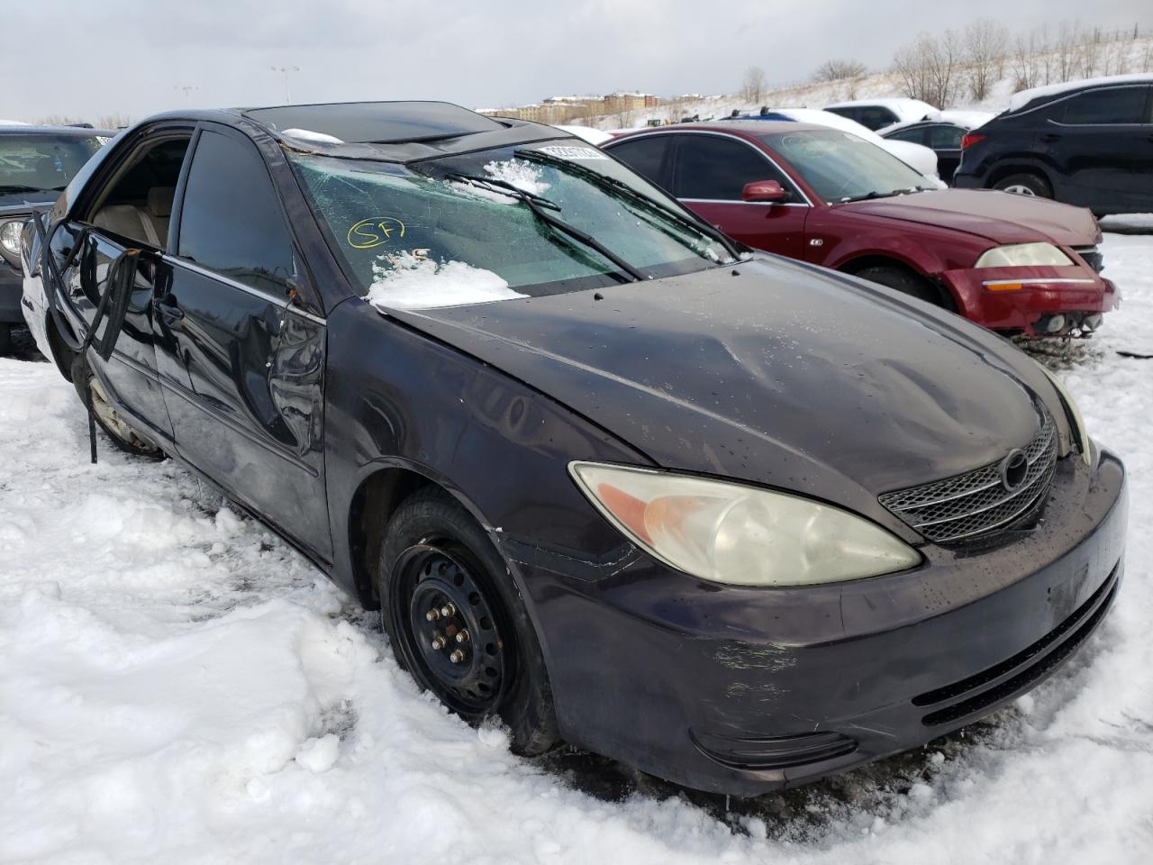 TOYOTA CAMRY LE 2002 with VIN 4T1BF30K12U511203 - Photo from auction