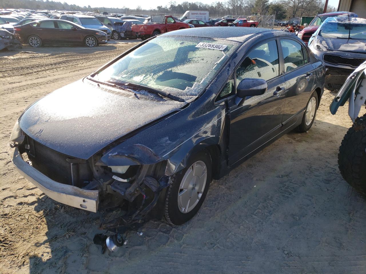 Photo 2 from auction – 2006 HONDA CIVIC HYBR with VIN JHMFA362X6S024366