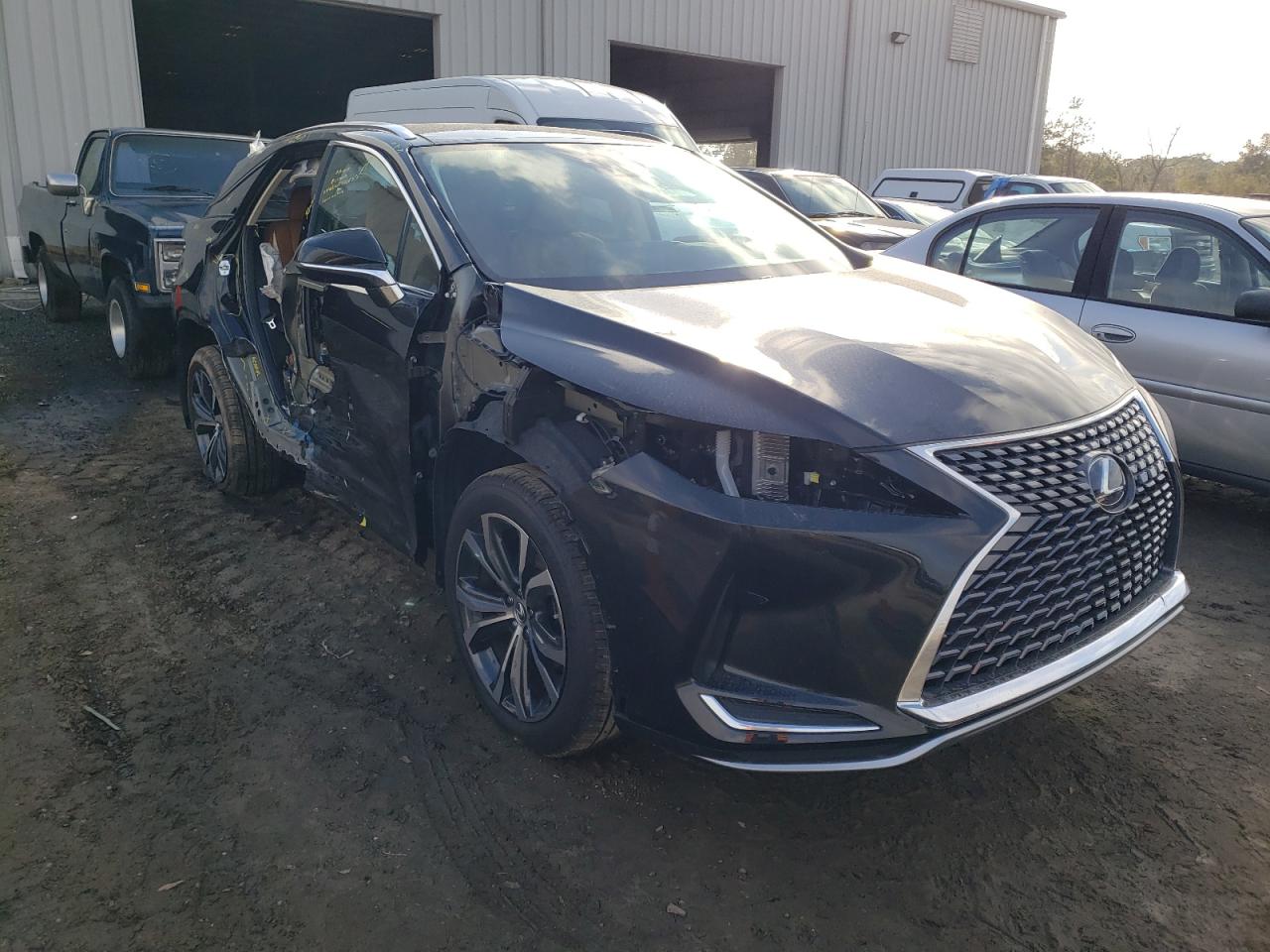 LEXUS RX 450H 2022 with VIN 2T2HGMDA7NC074338 - Photo from auction