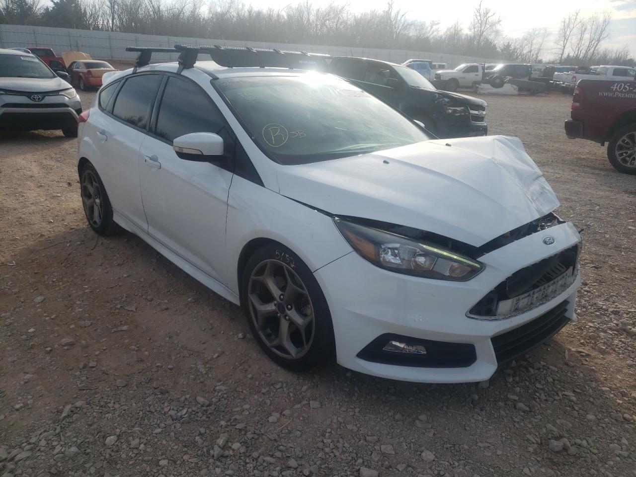 FORD FOCUS ST 2017 with VIN 1FADP3L95HL299364 - Photo from auction