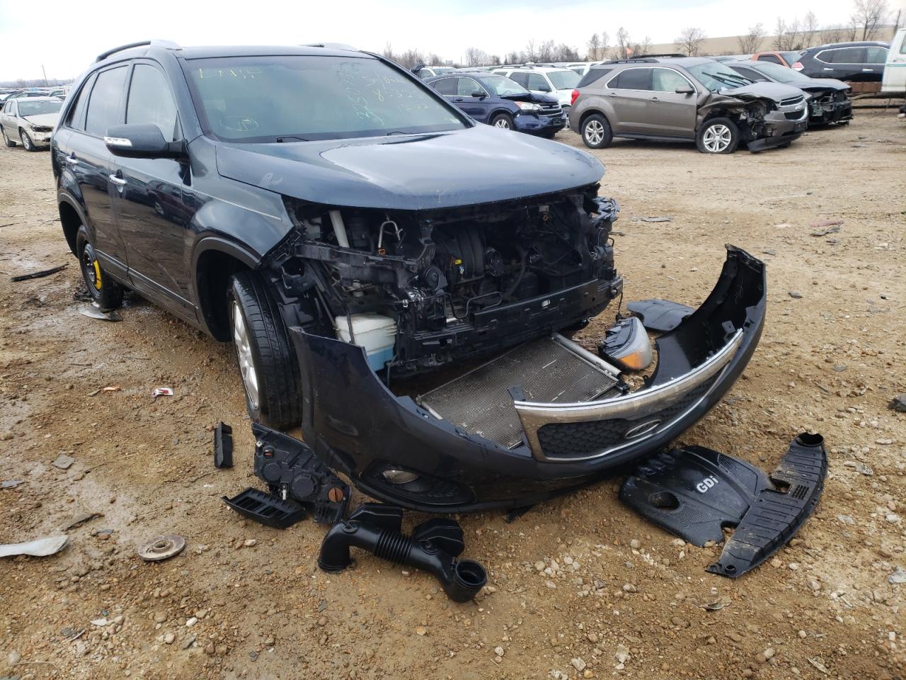 KIA SORENTO LX 2013 with VIN 5XYKT4A68DG317518 - Photo from auction