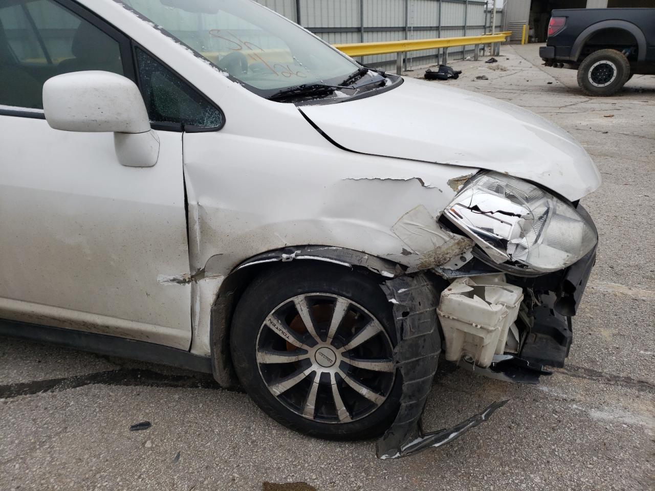 Photo 9 from auction – 2011 NISSAN VERSA S with VIN 3N1BC1CP3BL358927