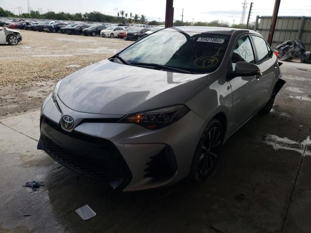 Photo 2 from auction – 2018 TOYOTA COROLLA L with VIN 5YFBURHEXJP761238